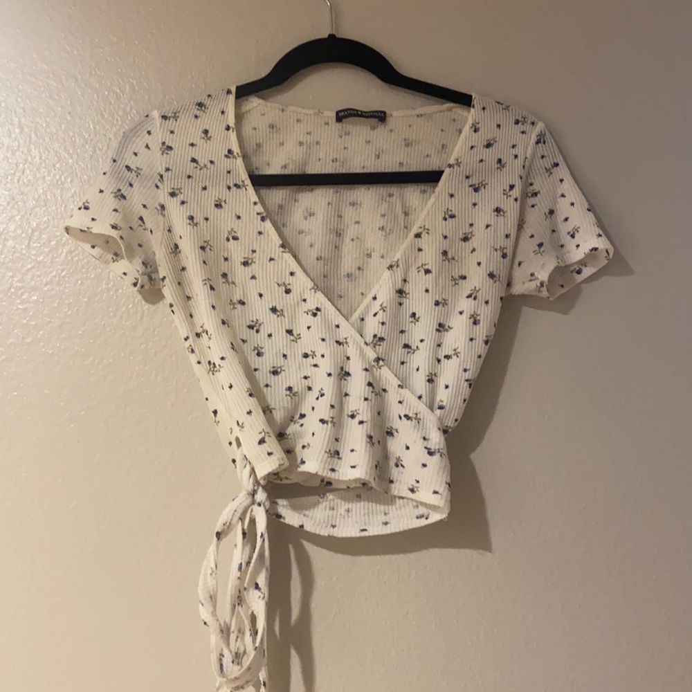 White floral wrap top.